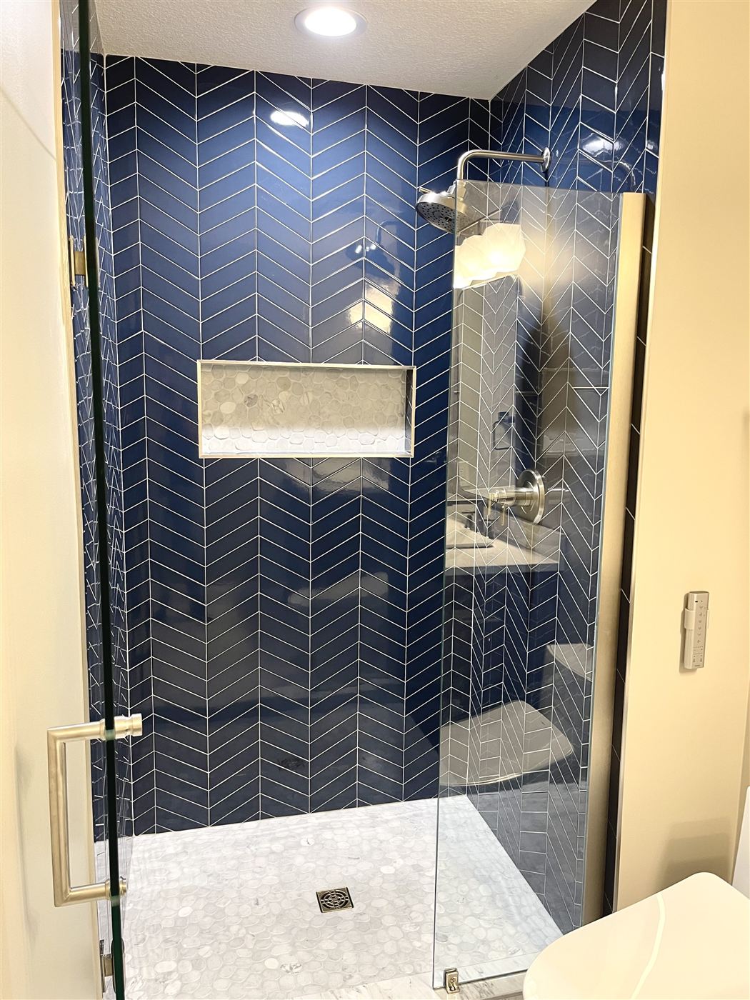 Herringbone tile shower